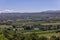 Panoramic view ofÂ Little Luberon valley from hilltop, vineyards, orchards, cultivated fields, deciduous treesin the summer